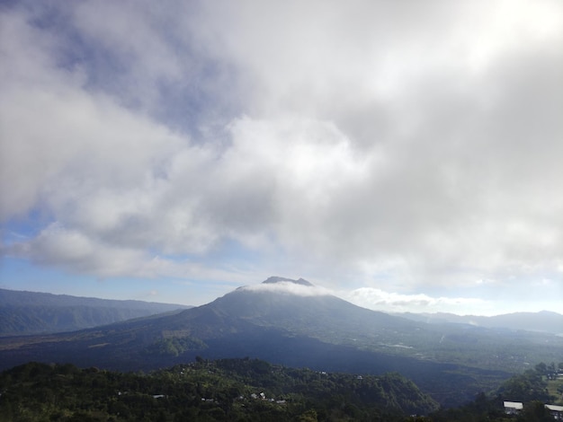 A mountain is seen in the distance with a mountain in the background.