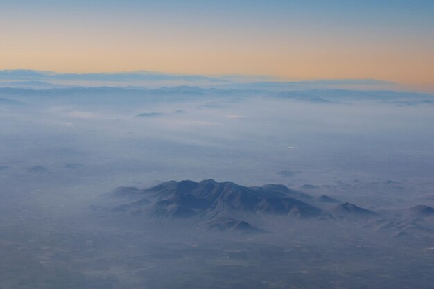 A mountain is visible from the sky above