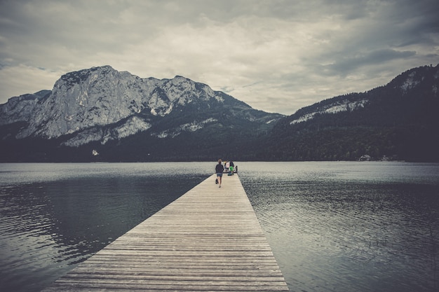 Mountain lake in Austrian Alps. beautiful view of the water surface and floating boats and kayaks