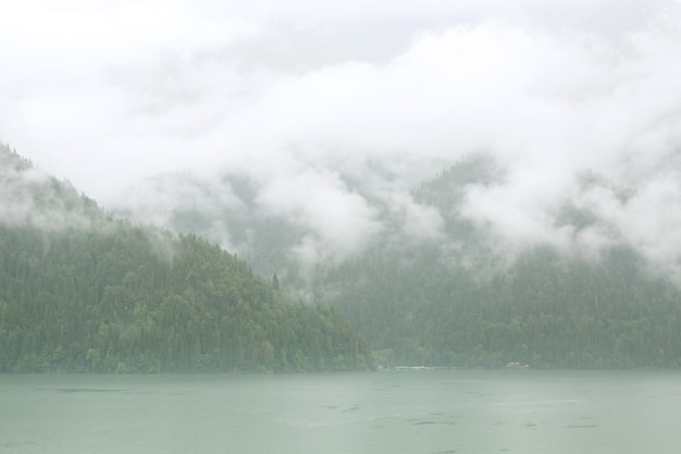 Mountain lake in the fog