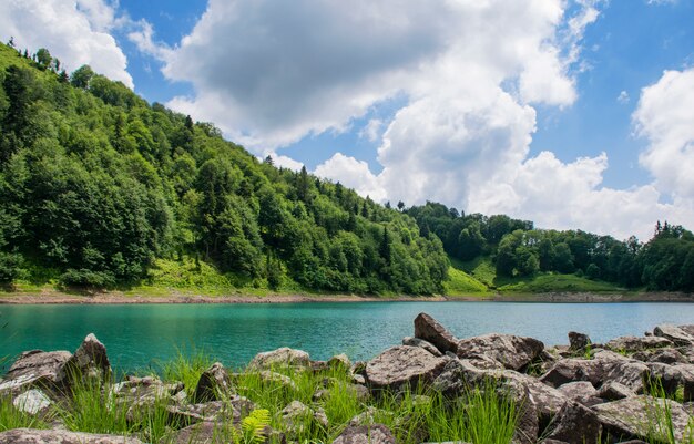 Mountain lake in a valley in Georgia on a summer day