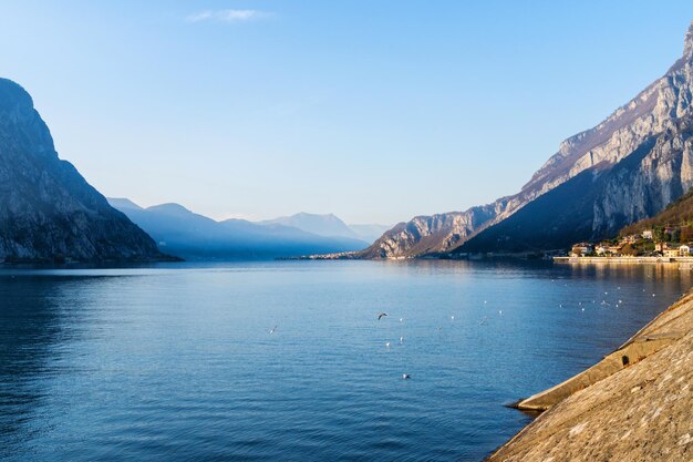 Mountain landscape picturesque mountain lake in the summer morning large panorama como italy