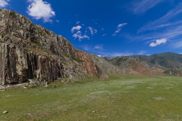 Mountain landscape with clouds.