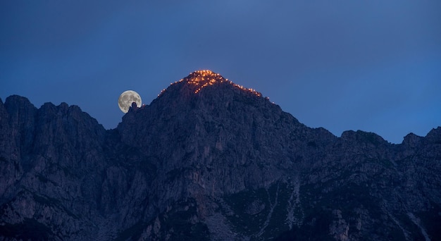 Mountain lit with torches