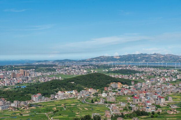 The mountain overlooks the rich villages and towns