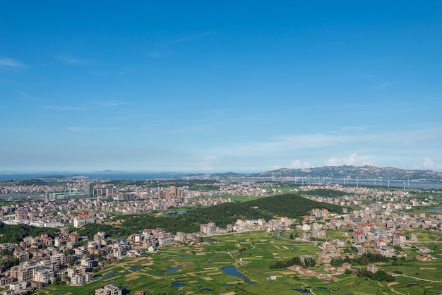 The mountain overlooks the rich villages and towns