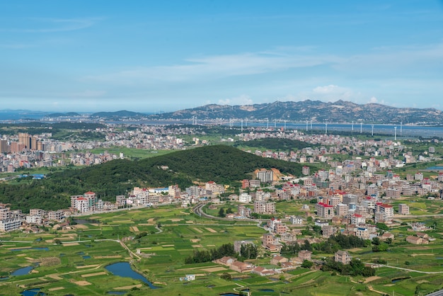 The mountain overlooks the rich villages and towns