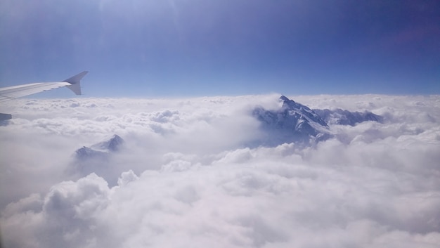 Mountain peak emerge from the cloud.