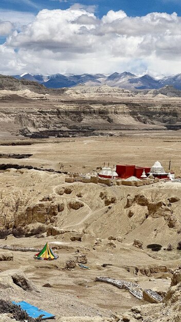 A mountain range is seen in the background.