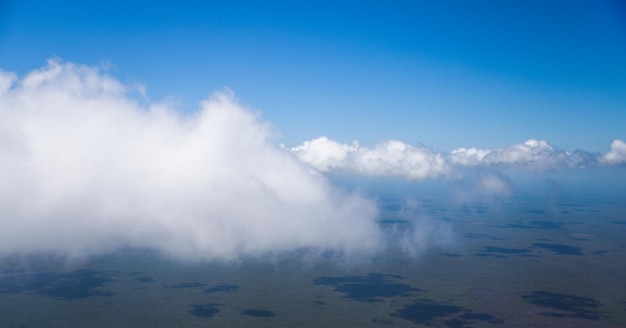 A mountain range with clouds