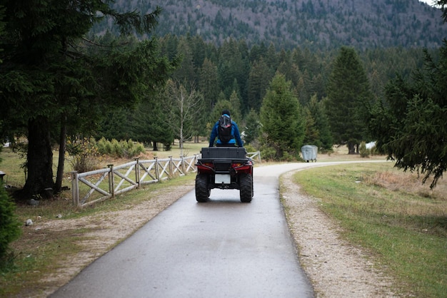 Mountain Rescuer Drives With Quad