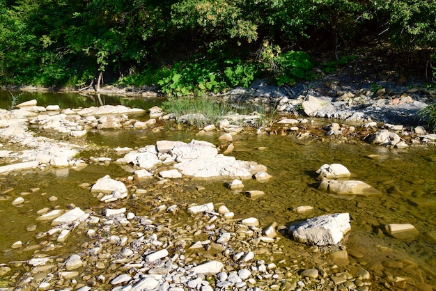 The mountain river Shallow mountain river water flows through the rocks