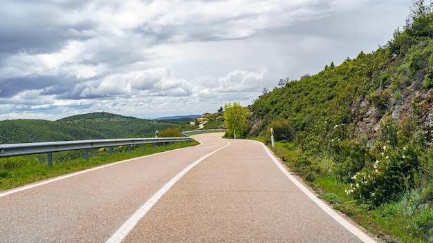 Mountain road with curves that go to the small town Guadarrama Madrid