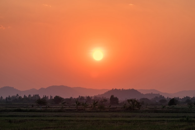 Mountain scene in countryside at sunset