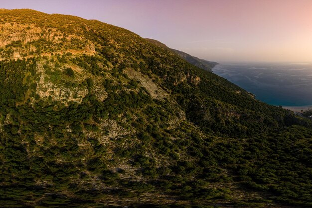 Mountain and sea sunrise panorama