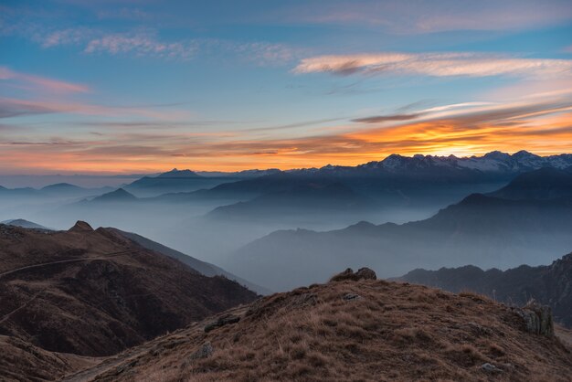 Mountain silhouette and stunning sky at sunset