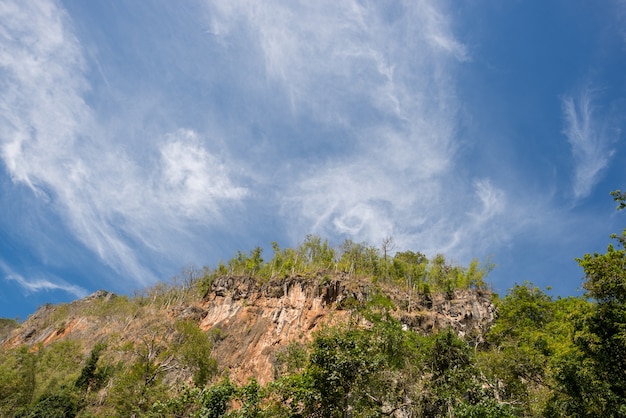 Mountain sky Green tree