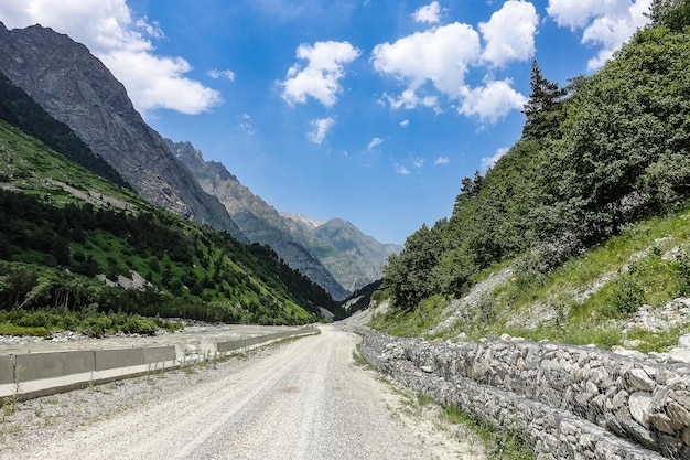 A mountain valley in the gorge of the CherekBalkar river in the vicinity of the Ushtulu tract Caucasus 2021