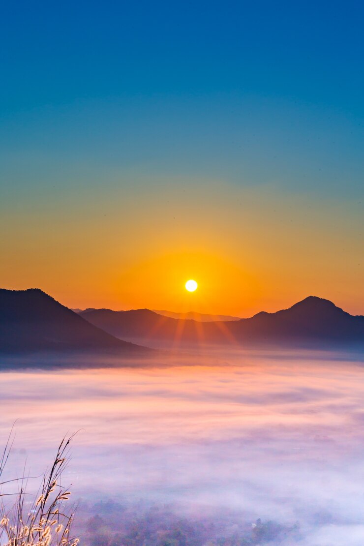 Mountain valley during sunrise. Natural summer landscape
