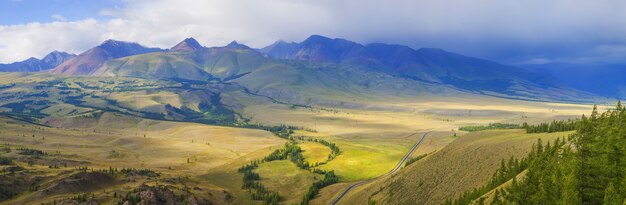 Mountain view with eternal light and stormy sky