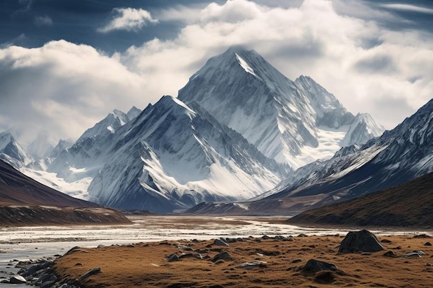 a mountain with a cloudy sky in the background