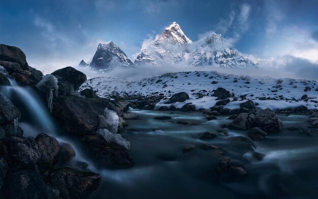 a mountain with a river flowing through it