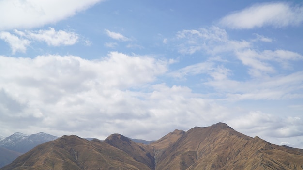 Mountain with some cloud on the blue clear sky