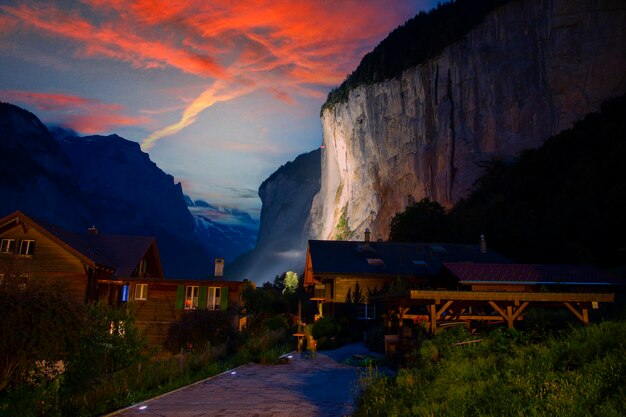 a mountain with a sunset in the background