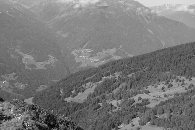 a mountain with a valley in the background