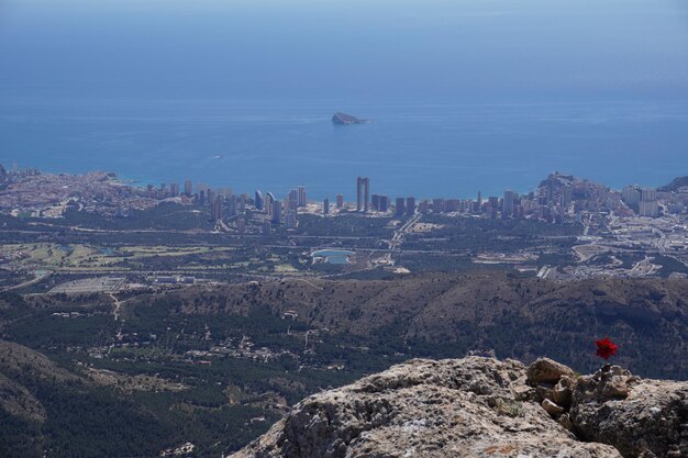 A mountain with a view of the city of barcelona