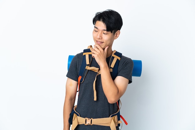 Mountaineer  man with isolated looking to the side and smiling