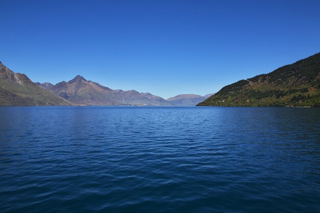 Mountains along the bay near Queenstown, New Zealand