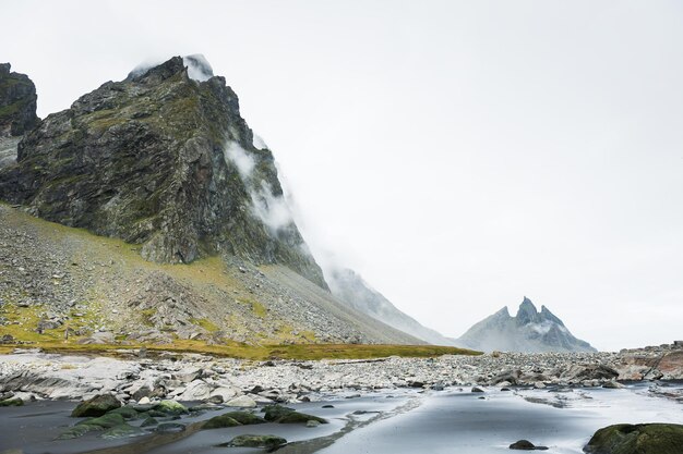 Mountains on the coast of Atlantic ocean. East Iceland