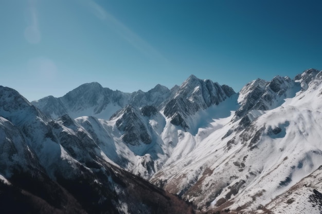 Photo mountains cover with snow and clear blue sky