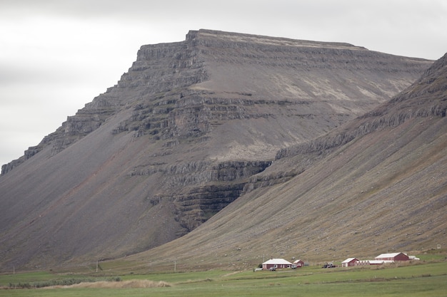 Mountains landscape with Icelandic Houses