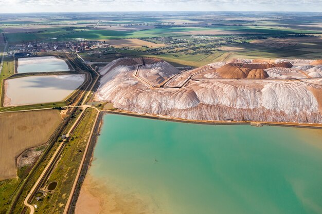 Mountains of products for the production of potash salt and artificial turquoise reservoirs