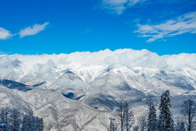 Mountains with white snow and blue sky