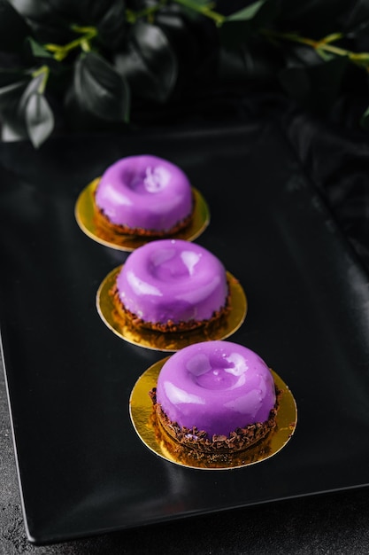 Mousse cakes from wild berries on plate