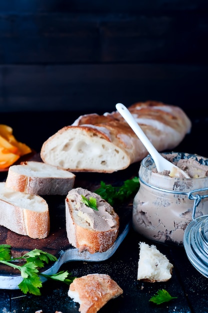 mousse, pate in a jar with  baguette and parsley