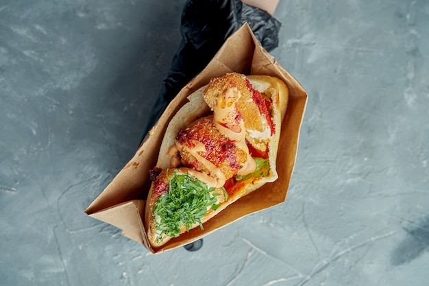 Mouth-watering Greek pita sandwich with deep-fried cheese, cilantro, and white sauce