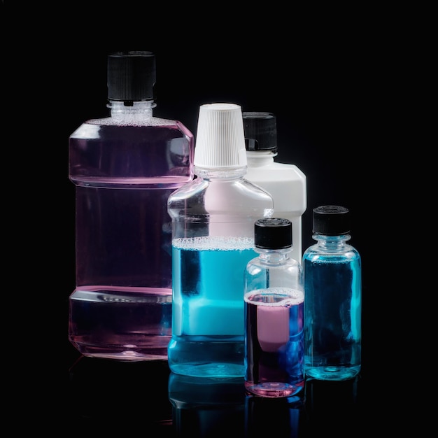 Photo mouthwash rinses on black background