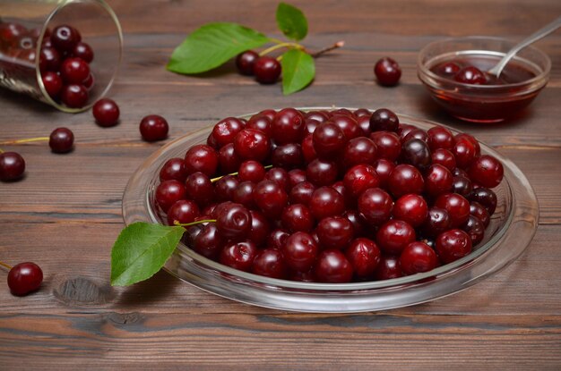 Mouthwatering ripe cherries and cherry jam