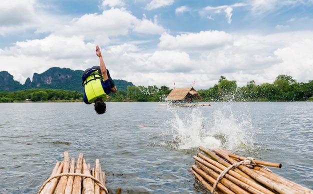 Movement of Man enjoy jumping to the dam