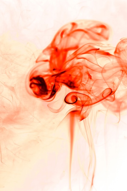 Movement red smoke on white background.