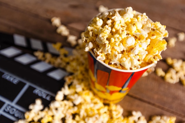 Movie clapper board and pop corn