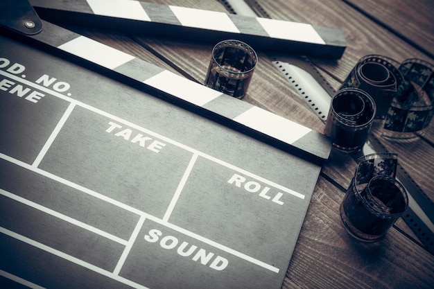 movie clapper template on wooden backround