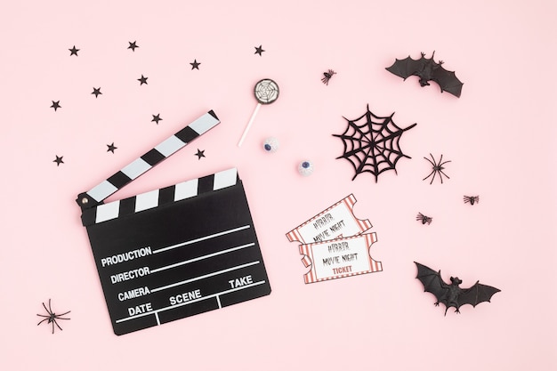 Movie clapperboard and Halloween decoration  