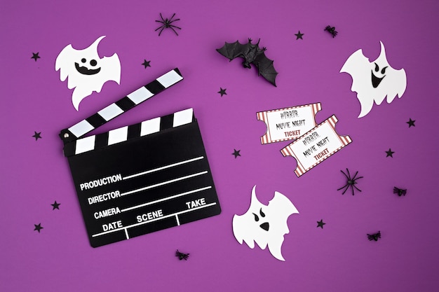 Premium Photo | Movie clapperboard and halloween decoration