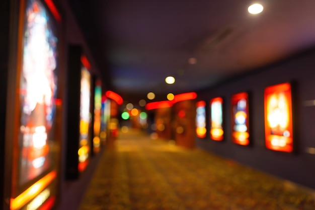 Movie theater entrance interior blur image use for background
of business and cinema concept abstract blurred image of lobby of
movie theater in vietnam