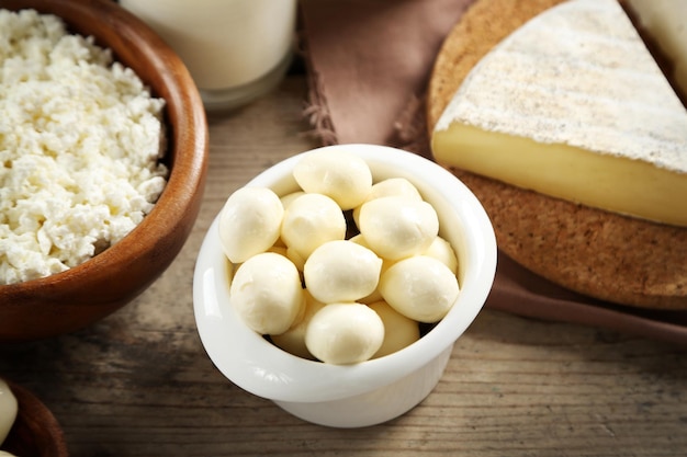 Mozzarella cheese in bowl on table